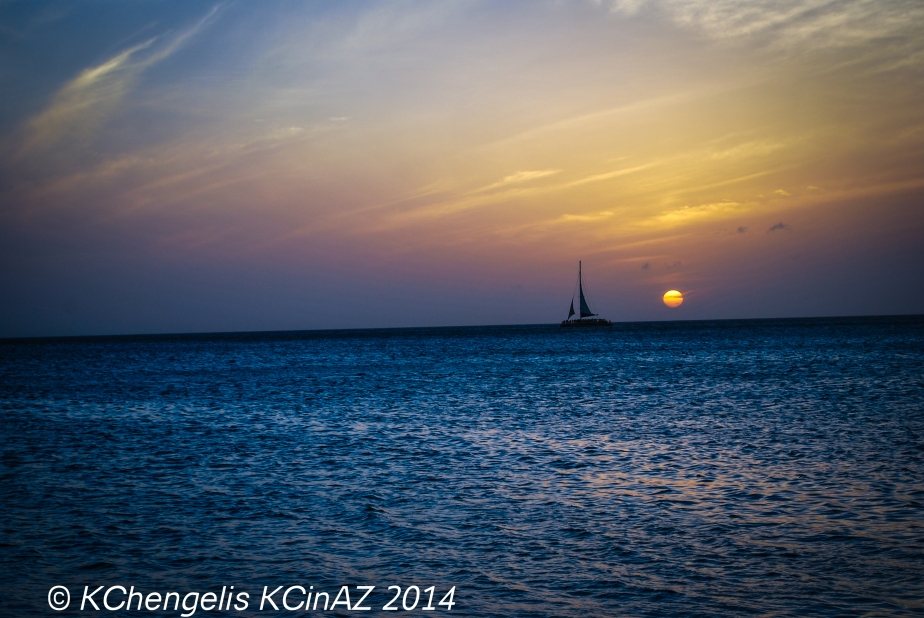 Lone Sail at Sunset